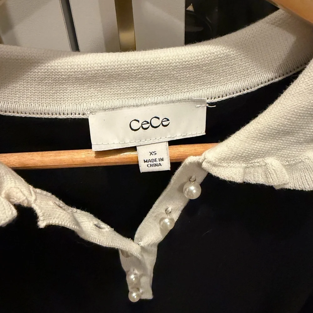 CeCe Black Top with White Ruffle Details - Picture 5 of 6